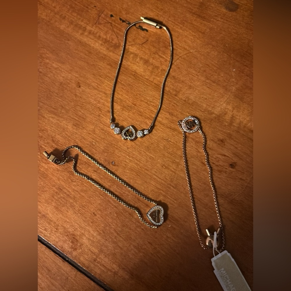 3 Micheal Kors Braclets